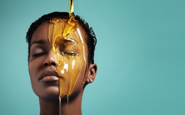 woman-with-honey-dripping-over-face.jpg